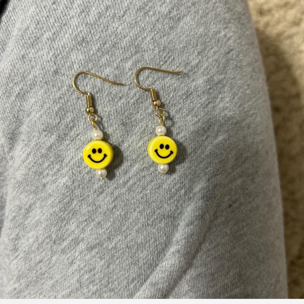 Smiley face dangle earrings